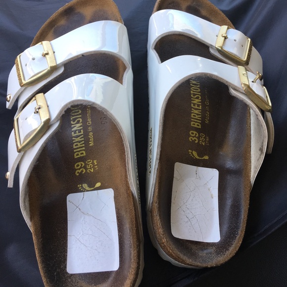 white birkenstocks gold buckle